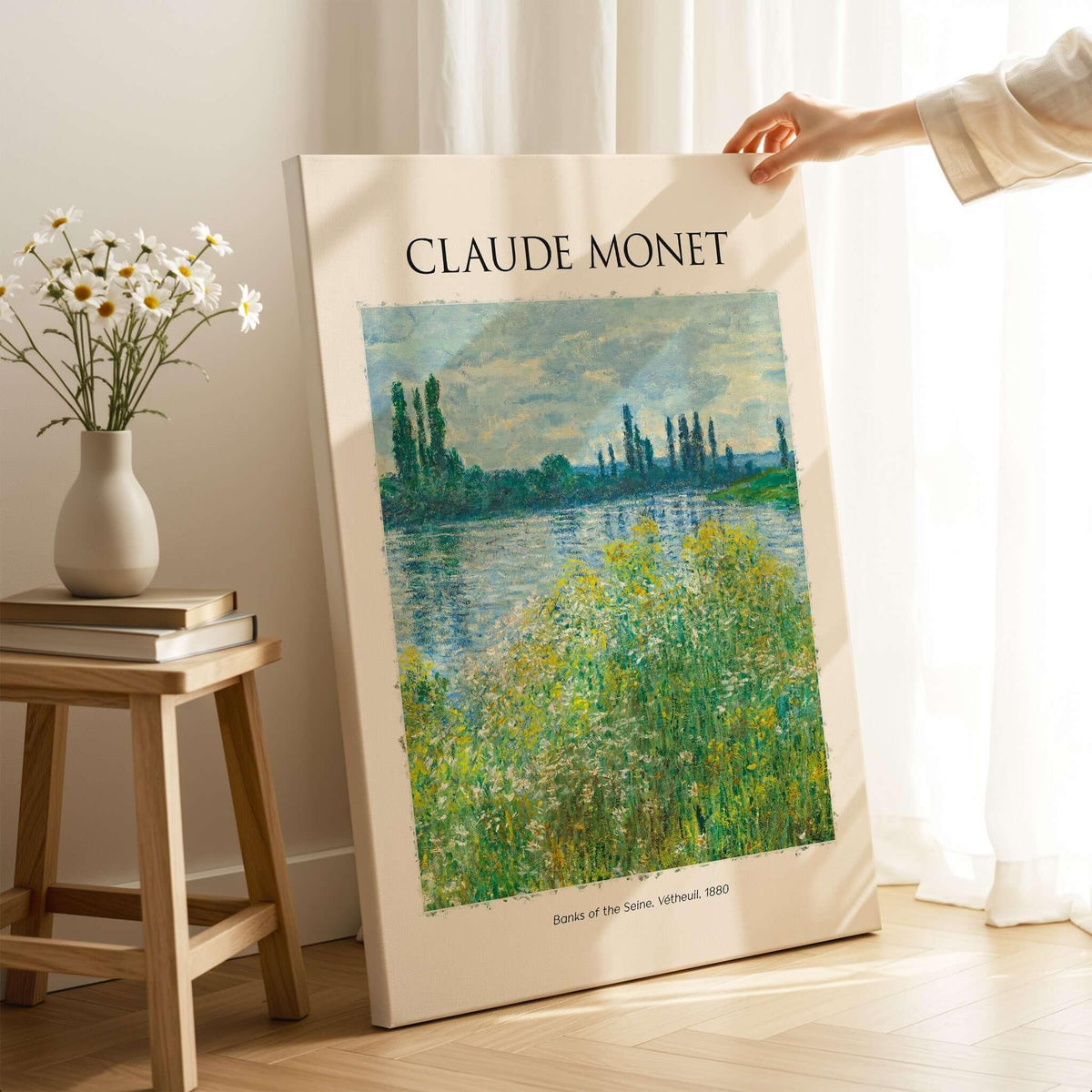 Monet Banks of the Seine Vétheuil River Landscape Art Print Poster displayed in a cozy room with flowers.