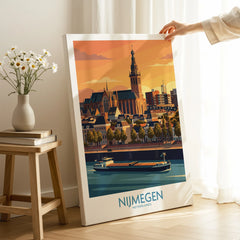 Nijmegen Netherlands travel poster print with city skyline and river, hand holding canvas in cozy room