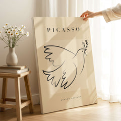 Picasso Dove of Peace Olive Branch Line Art Poster Modern Gallery Print displayed in a bright room with flowers.
