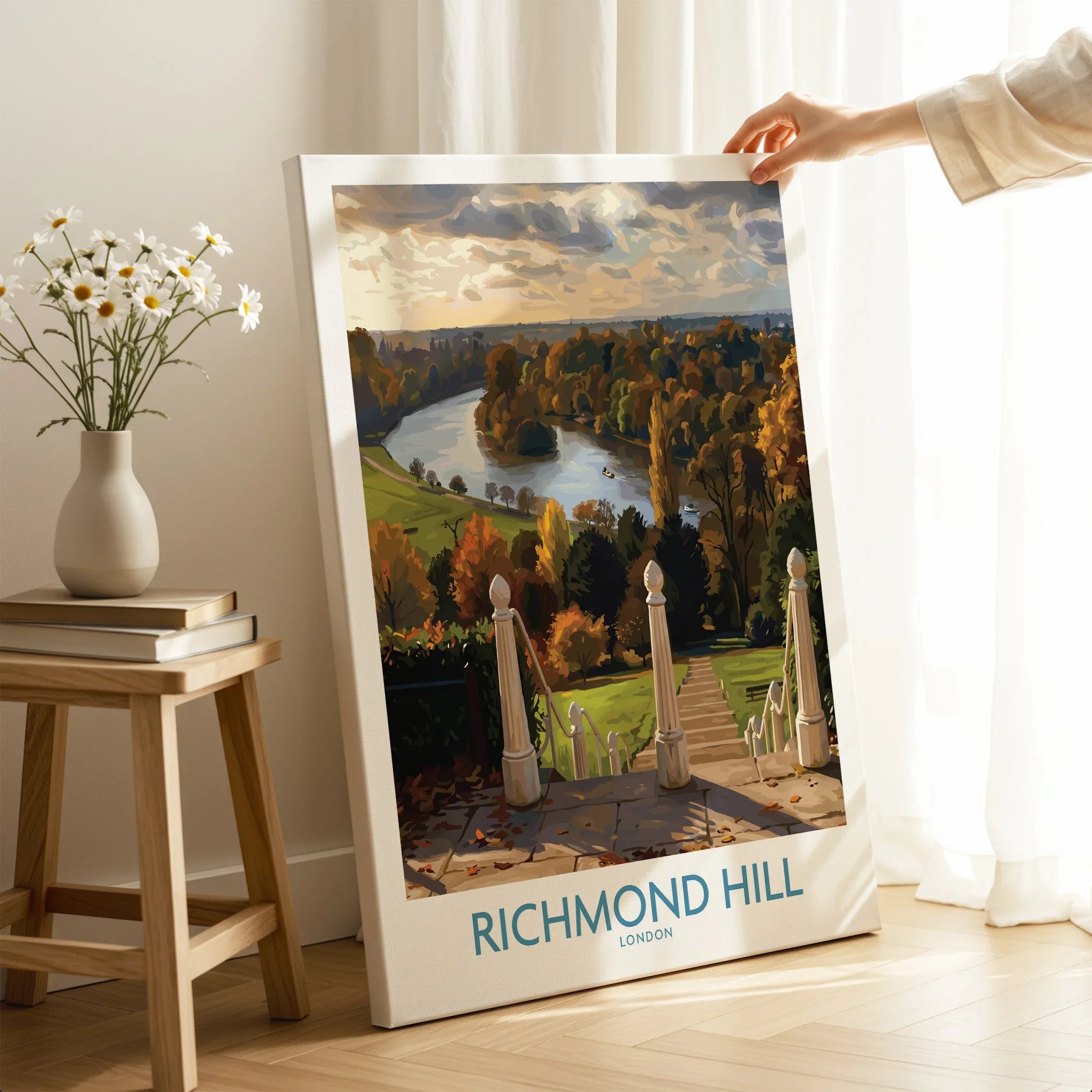 Hand holding Richmond Hill London travel poster canvas print in bright modern room