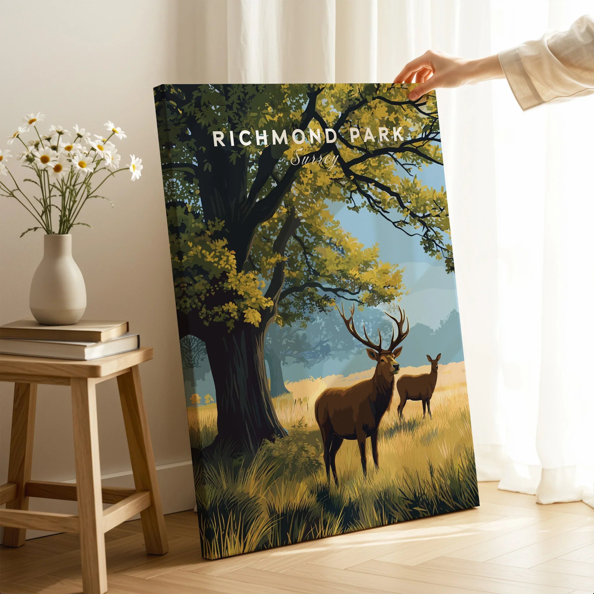 Richmond Park canvas print with deer and trees, displayed in a bright, cozy room