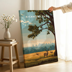 Richmond Park canvas print with deer and skyline, hand holding artwork in modern room
