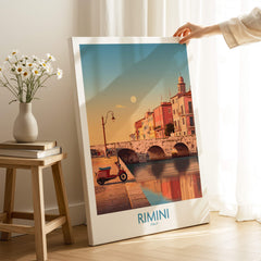 Rimini Italy Poster | Vintage Vespa & Historic Bridge Canvas Print displayed in a cozy interior setting.