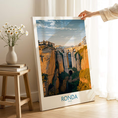 Ronda Spain Poster | Iconic Stone Bridge & Valley View Canvas Print showcased in a stylish interior setting.