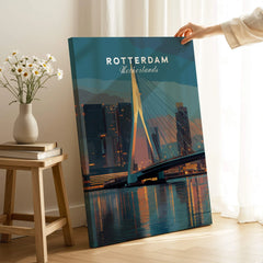 Rotterdam skyline canvas print with city bridge, hand holding artwork in modern home decor setting
