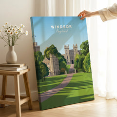 Hand holding Windsor England travel poster canvas in bright home decor setting