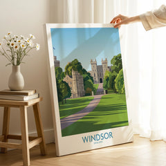 Hand holding Windsor England travel poster canvas print in modern home decor setting
