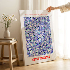 Yayoi Kusama Evil Eye Pattern Blue Contemporary Art Print Poster Paris Wall Decor displayed in a bright room.