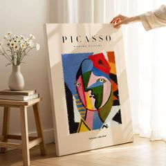 Picasso Geometric Face Abstract Art Print Colorful Cubist Portrait Poster Artwork Collection displayed in a room.