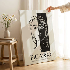 Picasso Portrait Deux Parties Black White Split Face Art Print Poster displayed indoors with natural light, highlighting modern design.