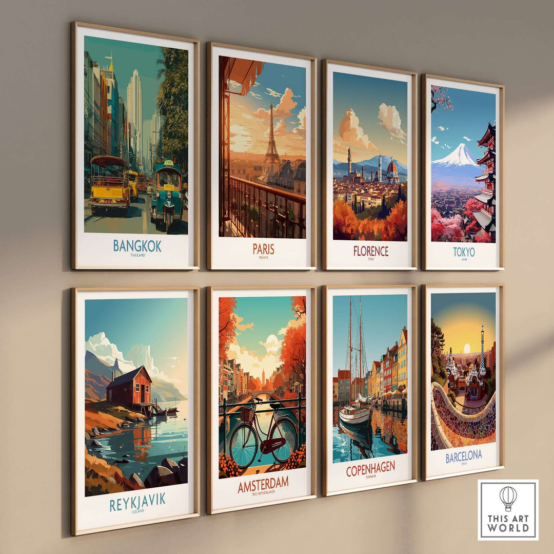 Colorful travel art prints on a wall featuring iconic cities like Bangkok, Paris, Florence, and Tokyo in a modern display.