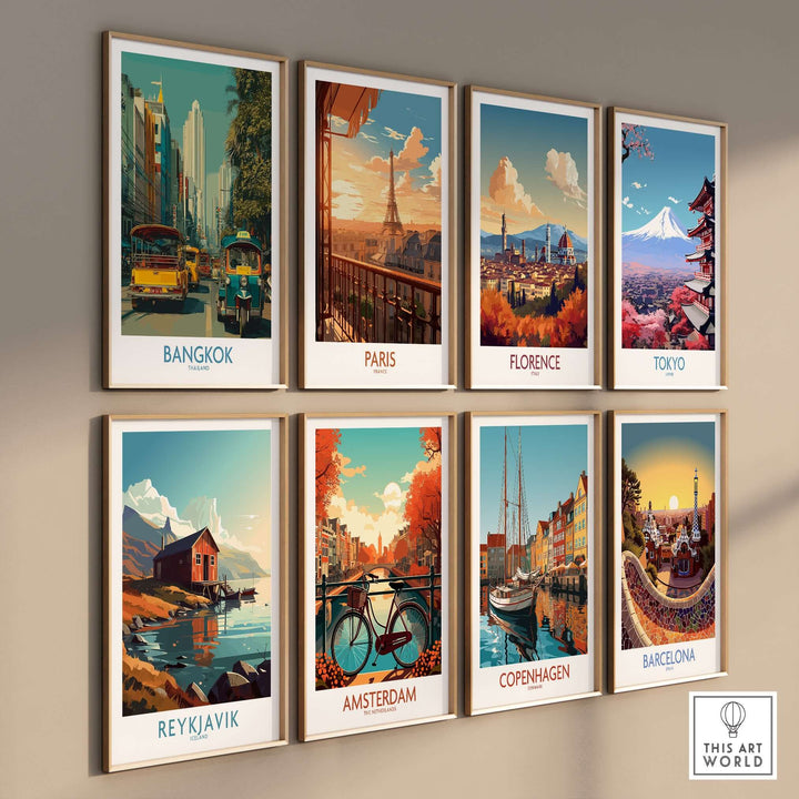 Colorful travel art prints on a wall featuring iconic cities like Bangkok, Paris, Florence, and Tokyo in a modern display.