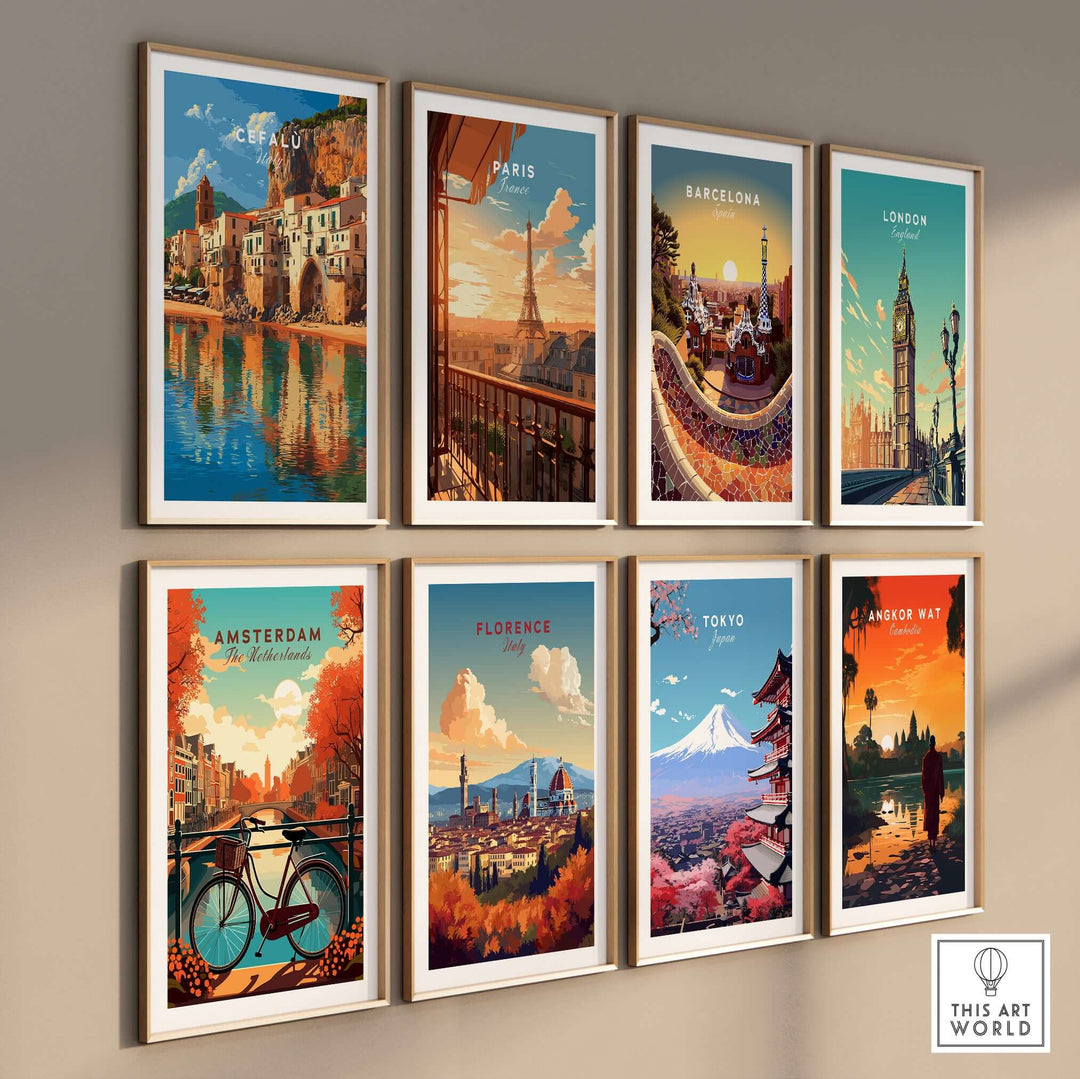 Collection of vintage travel prints featuring cities like Cefalù, Paris, and Tokyo framed on a wall.