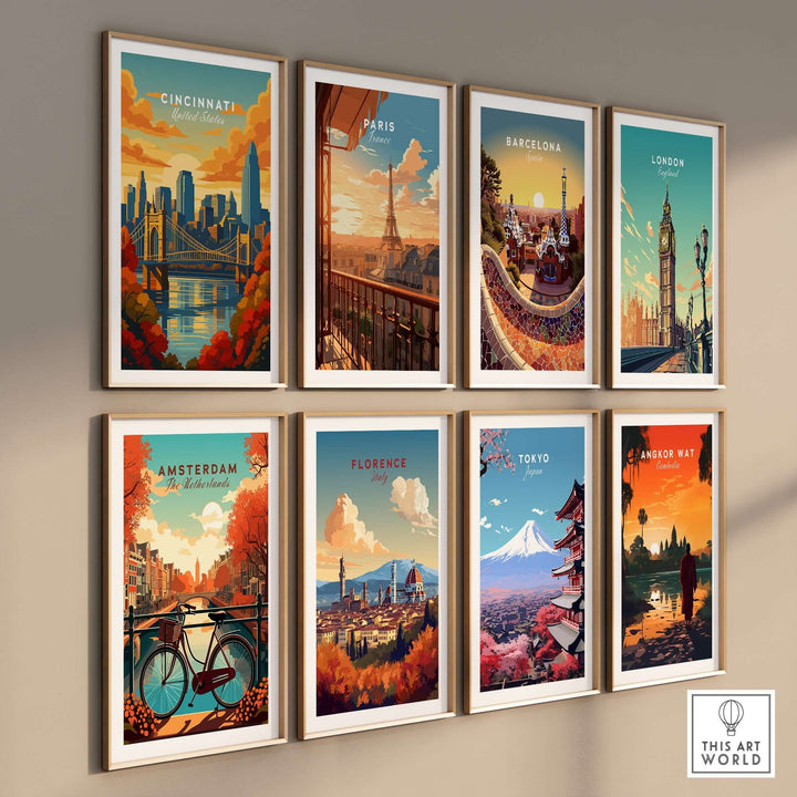 Gallery wall featuring vintage travel posters of Cincinnati, Paris, Barcelona, London, Amsterdam, Florence, Tokyo, and Angkor Wat.
