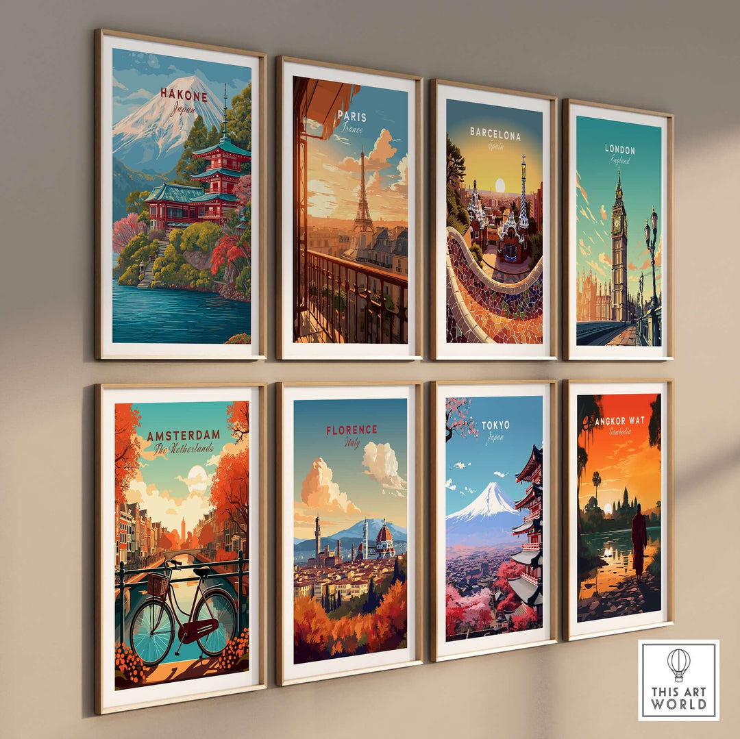 Gallery wall of travel posters featuring Hakone, Paris, Barcelona, London, Amsterdam, Florence, Tokyo, and Angkor Wat.