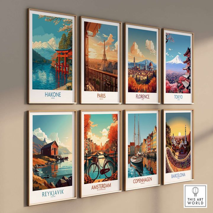 Gallery wall featuring vibrant travel posters of Hakone, Paris, Florence, Tokyo, Reykjavik, Amsterdam, Copenhagen, and Barcelona.