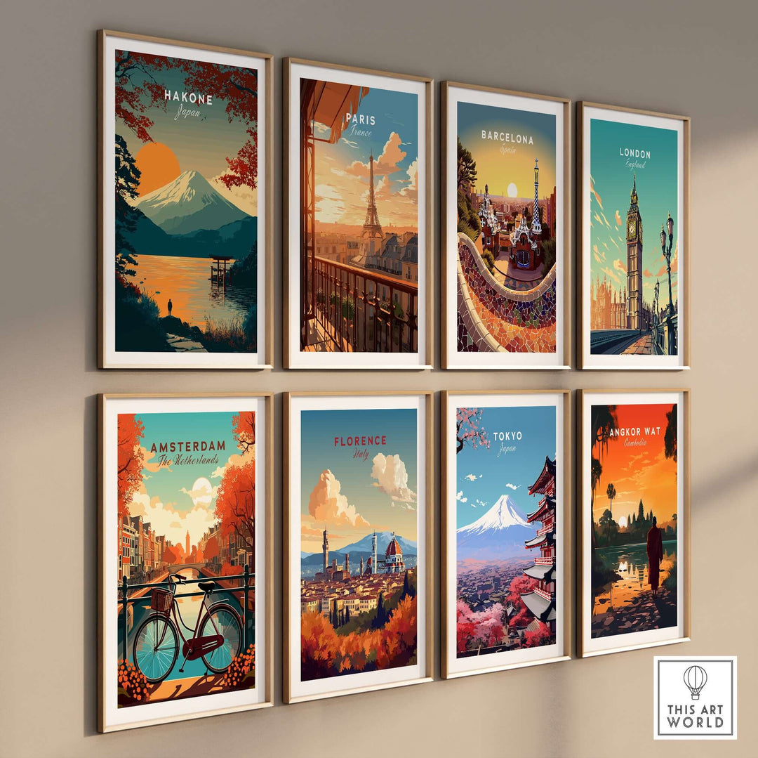 Gallery wall of travel posters featuring landscapes from Hakone, Paris, Barcelona, London, Amsterdam, Florence, Tokyo, and Angkor Wat.