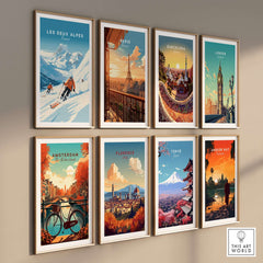Colorful travel posters displayed on a wall, featuring Les Deux Alpes, Paris, Barcelona, London, and more iconic destinations.