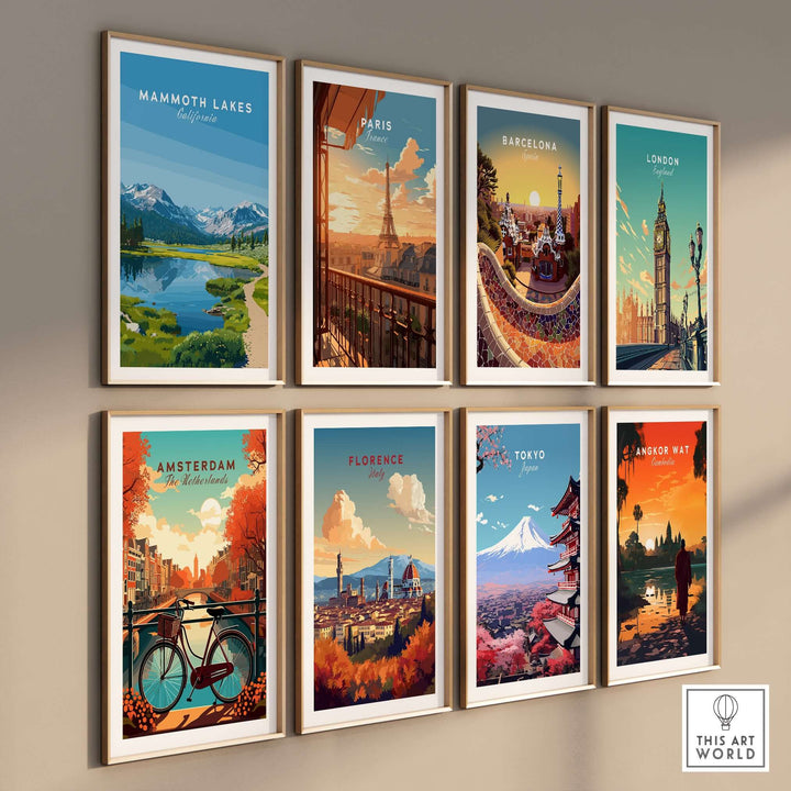 Gallery wall of framed city posters including Mammoth Lakes, Paris, Barcelona, London, Amsterdam, Florence, Tokyo, and Angkor Wat.