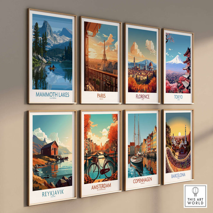 Collection of vibrant travel prints featuring Mammoth Lakes, Paris, Florence, Tokyo, and more, displayed on a wall.