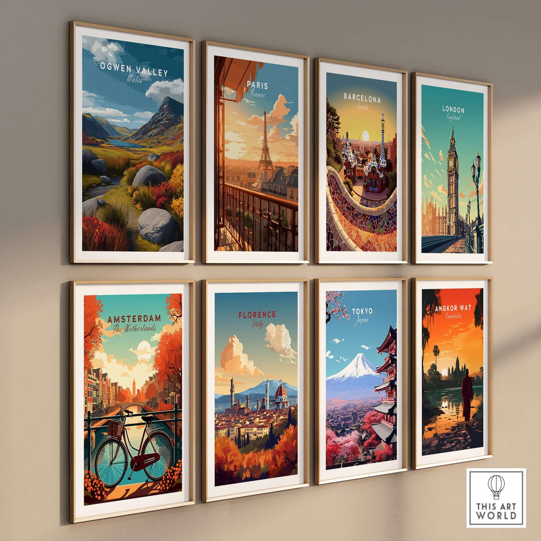 Gallery wall art featuring vibrant travel posters of Ogwen Valley, Paris, Barcelona, London, Amsterdam, Florence, Tokyo, and Angkor Wat.
