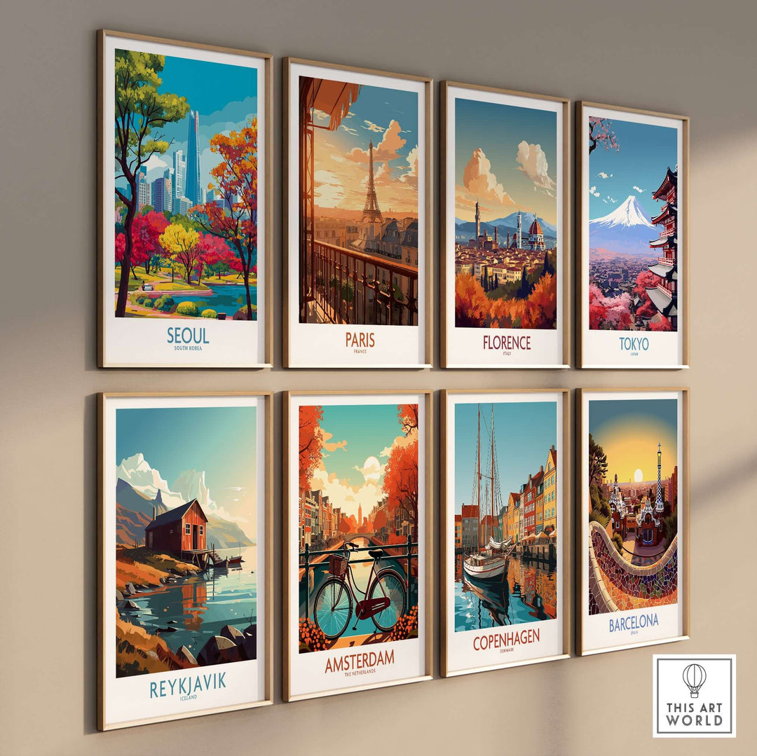 Gallery wall display of vibrant city posters featuring Seoul, Paris, Florence, Tokyo, Reykjavik, Amsterdam, Copenhagen, and Barcelona.