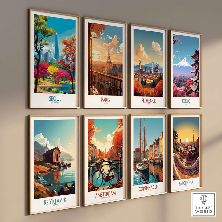 Gallery wall display of vibrant city posters featuring Seoul, Paris, Florence, Tokyo, Reykjavik, Amsterdam, Copenhagen, and Barcelona.
