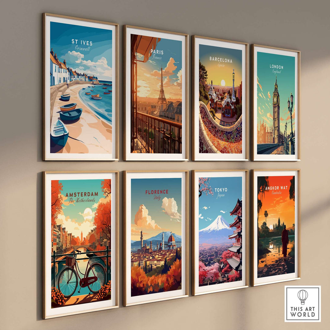 Gallery wall of vibrant travel posters featuring St Ives, Paris, Barcelona, London, Amsterdam, Florence, Tokyo, and Angkor Wat.