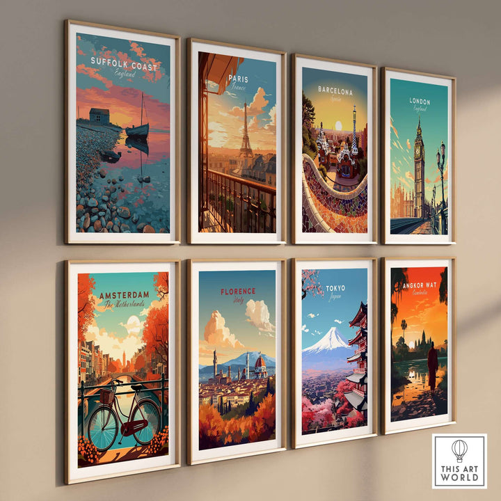 Gallery wall featuring travel prints: Suffolk Coast, Paris, Barcelona, London, Amsterdam, Florence, Tokyo, Angkor Wat.