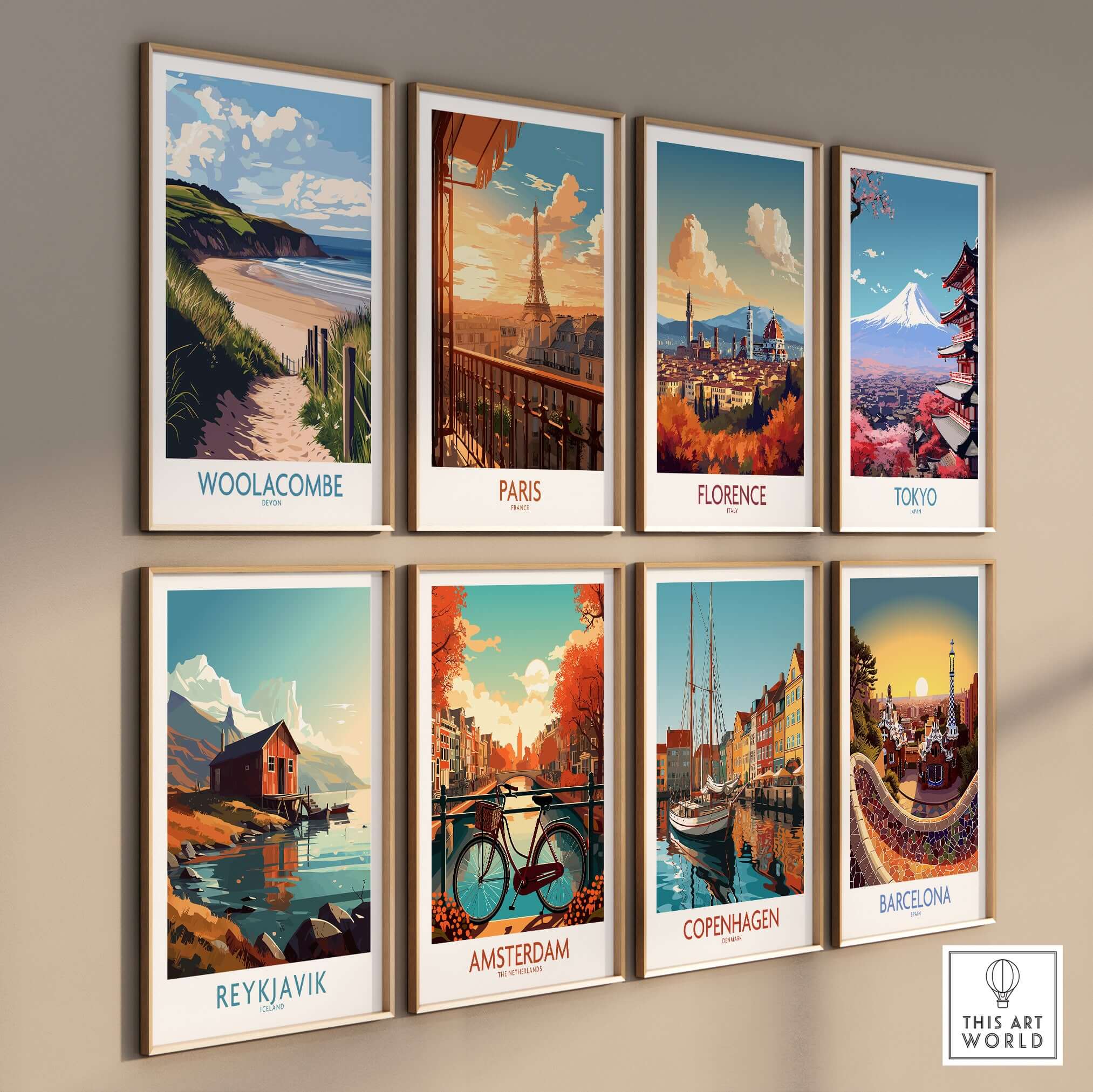 Woolacombe Devon Dunes to Ocean Poster - English Seaside Decor among various city posters on a wall.