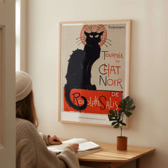 Exhibition Art Print Steinlen Tournée du Chat Noir Vintage French Black Cat Poster displayed on a wall in a cozy room.