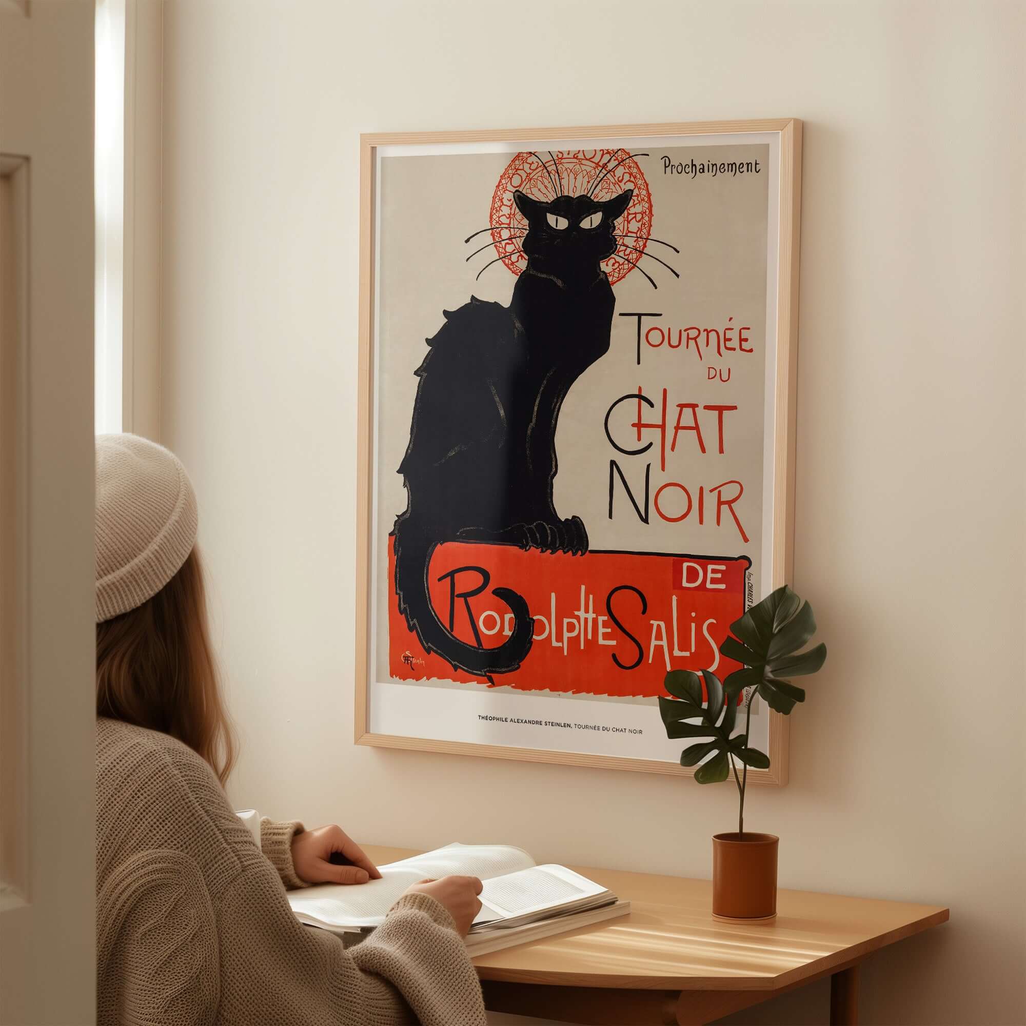 Exhibition Art Print Steinlen Tournée du Chat Noir Vintage French Black Cat Poster displayed on a wall in a cozy room.