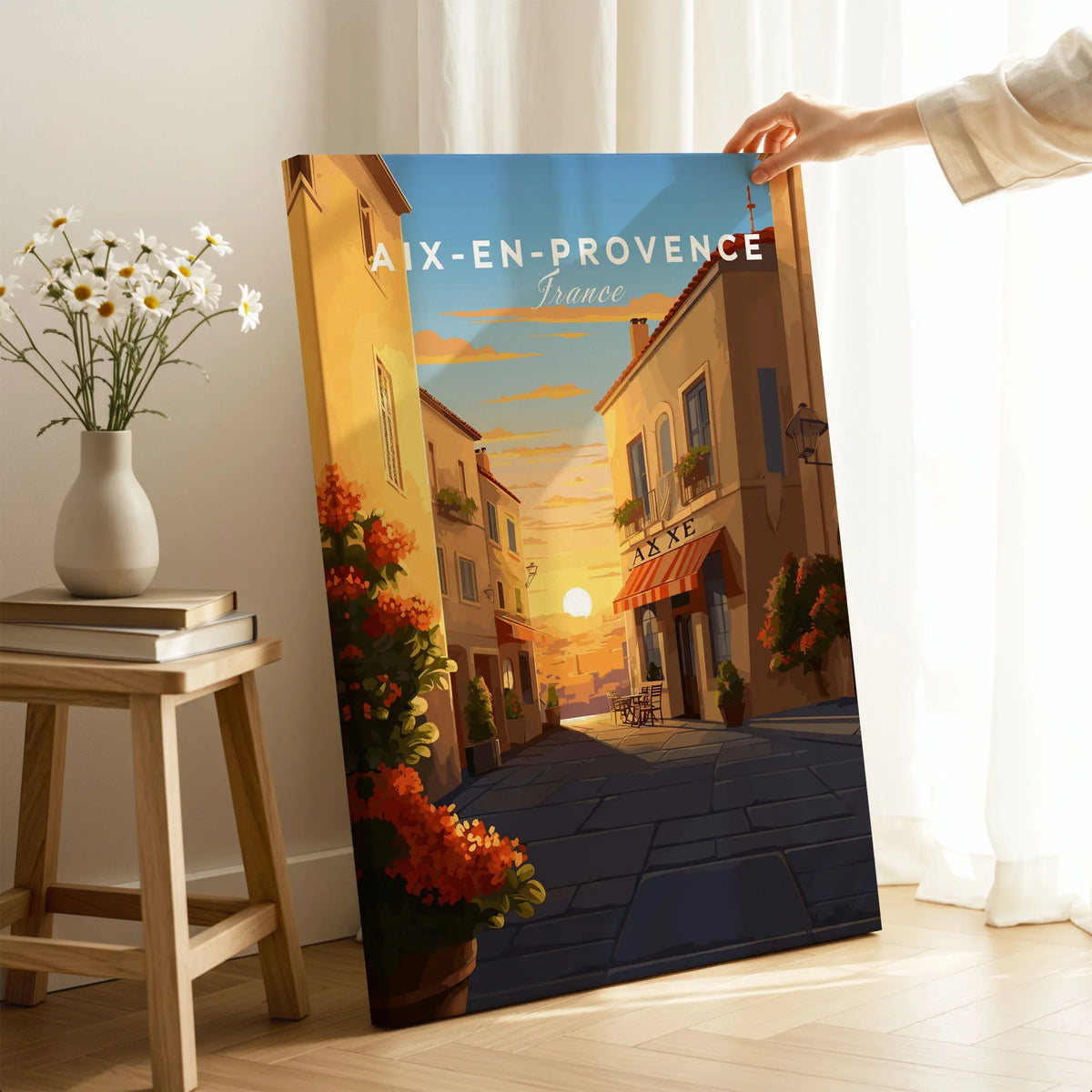 Aix-en-Provence Poster on stretched canvas with mirror-wrap edges, held by hand in a room setting