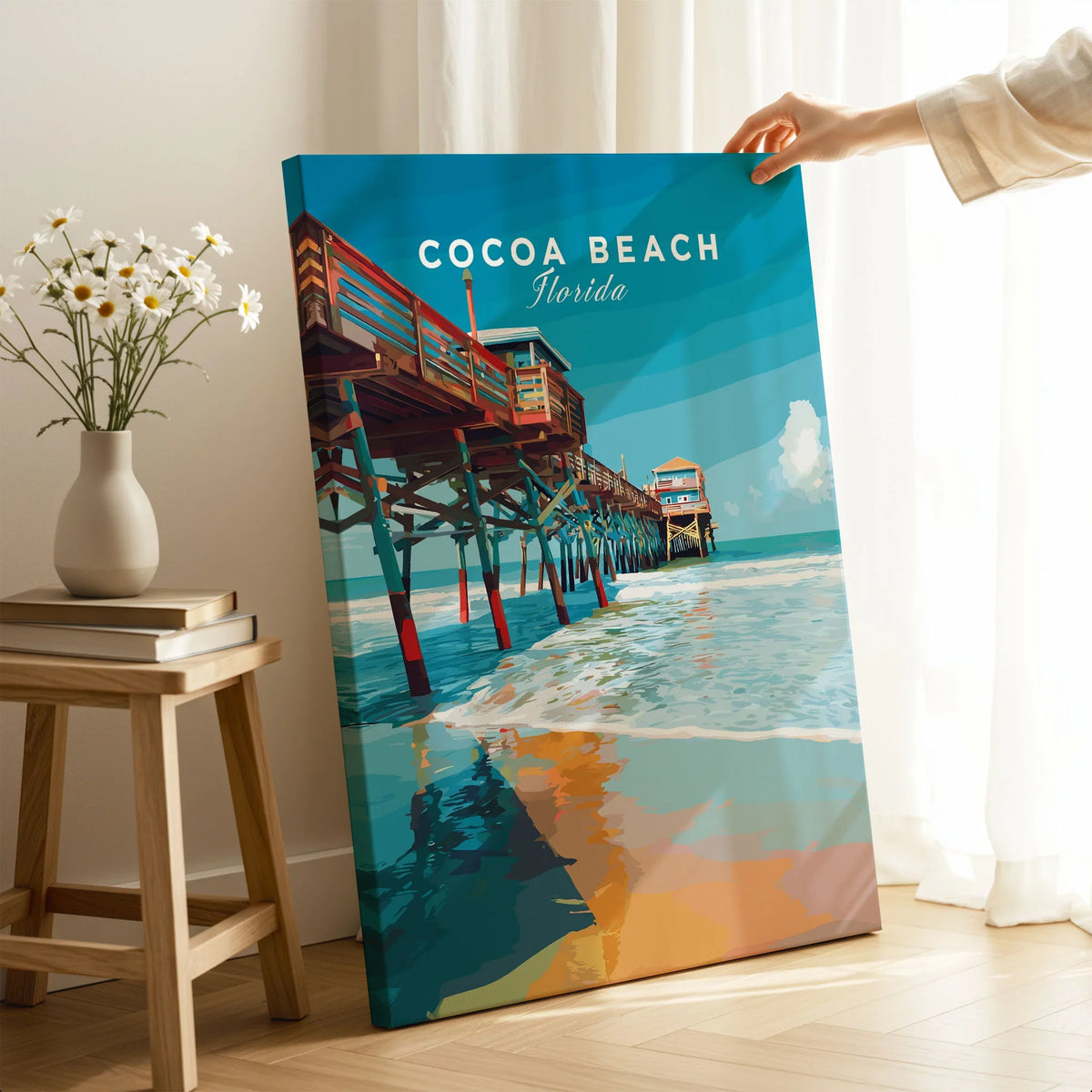 Cocoa Beach Florida Pier Print - Coastal Florida Wall Art on stretched canvas with mirror-wrap edges, held by hand in a room setting