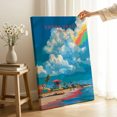 Cocoa Beach Lifeguard Stand Print - Florida Beach Wall Art on stretched canvas with mirror-wrap edges, held by hand in a room setting
