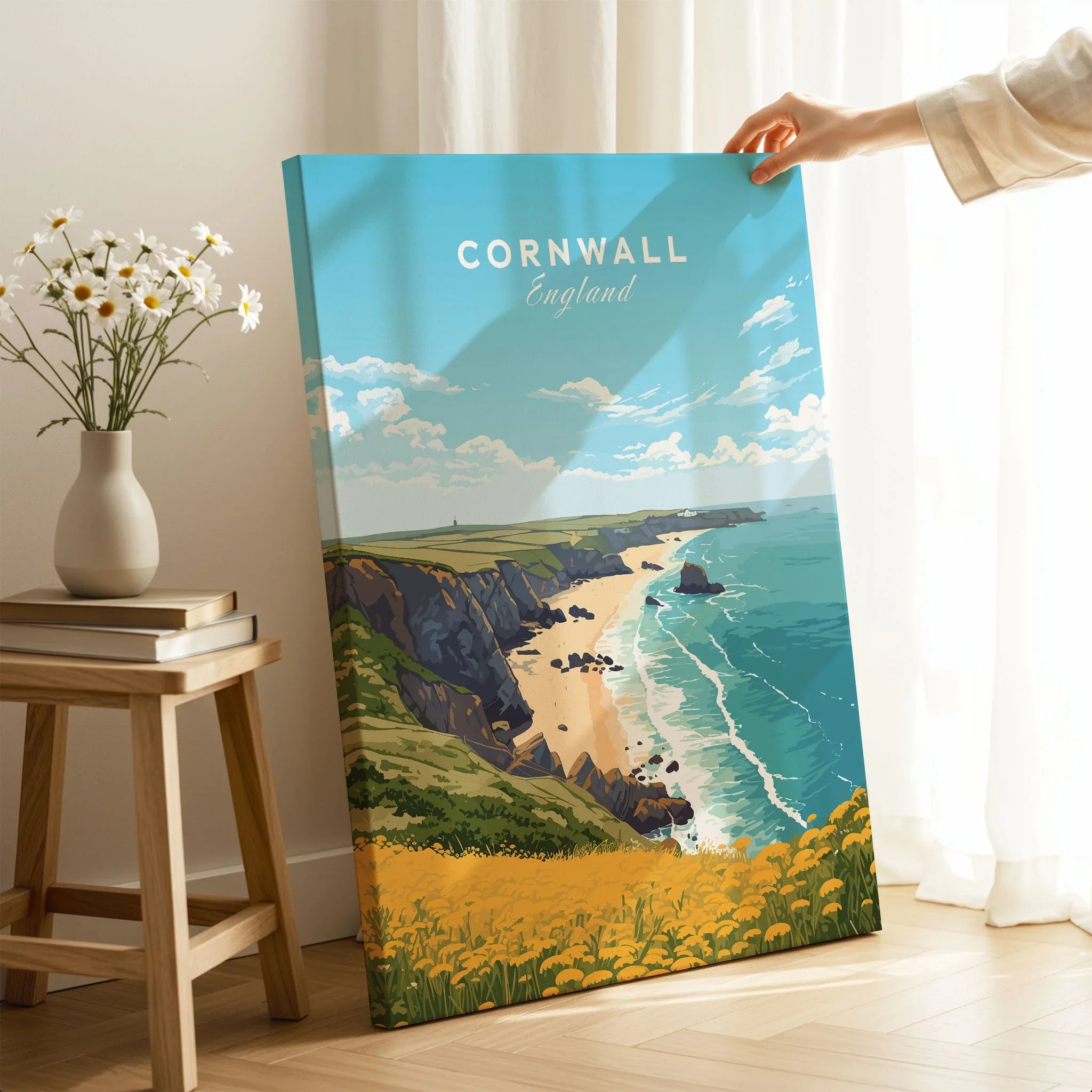 Cornwall Poster on stretched canvas with mirror-wrap edges, held by hand in a room setting