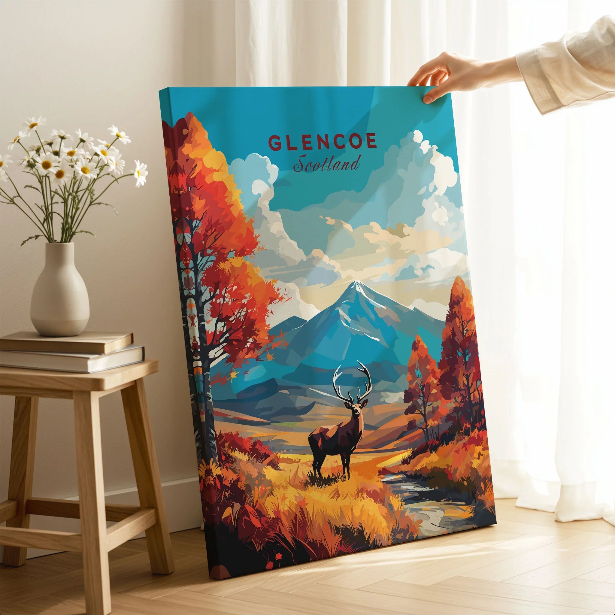 Glencoe Art Print on stretched canvas with mirror-wrap edges, held by hand in a room setting