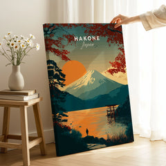 Hakone Japan Torii Gate Sunset Poster - Mount Fuji Lake Scene Print on stretched canvas with mirror-wrap edges, held by hand in a room setting