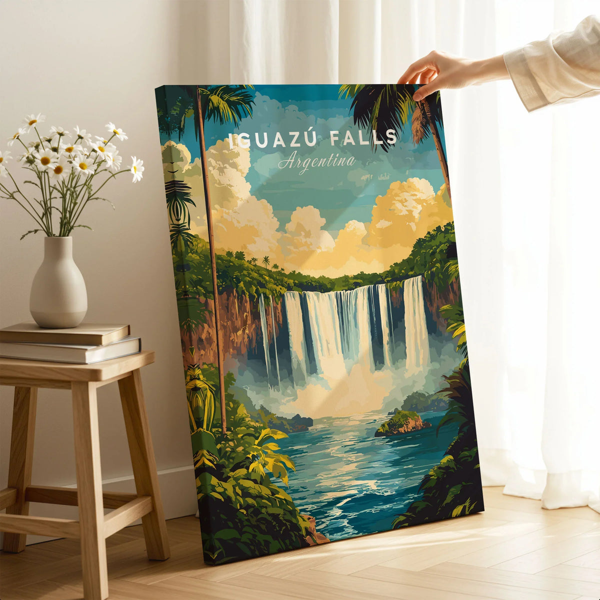 Iguazu Falls Wall Art on stretched canvas with mirror-wrap edges, held by hand in a room setting