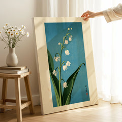 Lily of the Valley Art Print – Blue Japanese Botanical Wall Art — canvas print mirror edge hand holding room setting