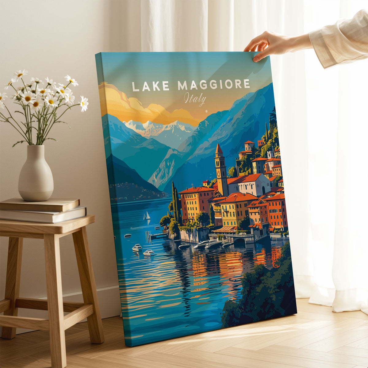 Lake Maggiore Print on stretched canvas with mirror-wrap edges, held by hand in a room setting