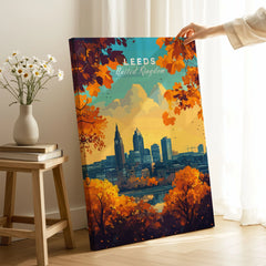 Leeds Wall Art Print - United Kingdom Travel Poster on stretched canvas with mirror-wrap edges, held by hand in a room setting