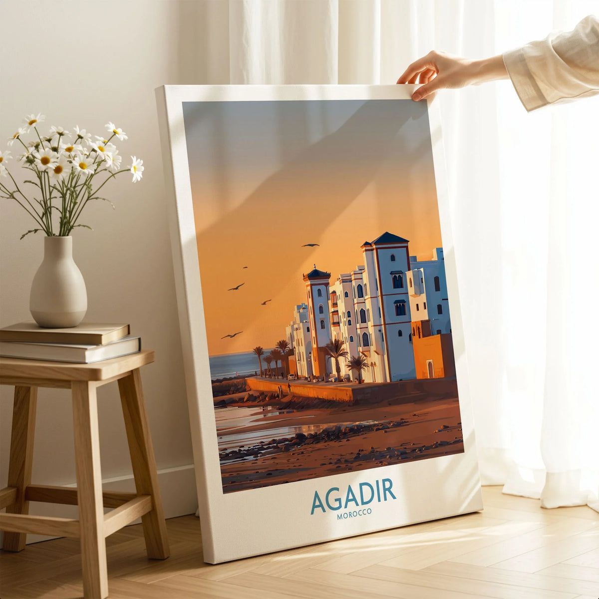 Agadir Morocco Wall Art on stretched canvas with mirror-wrap edges, held by hand in a room setting