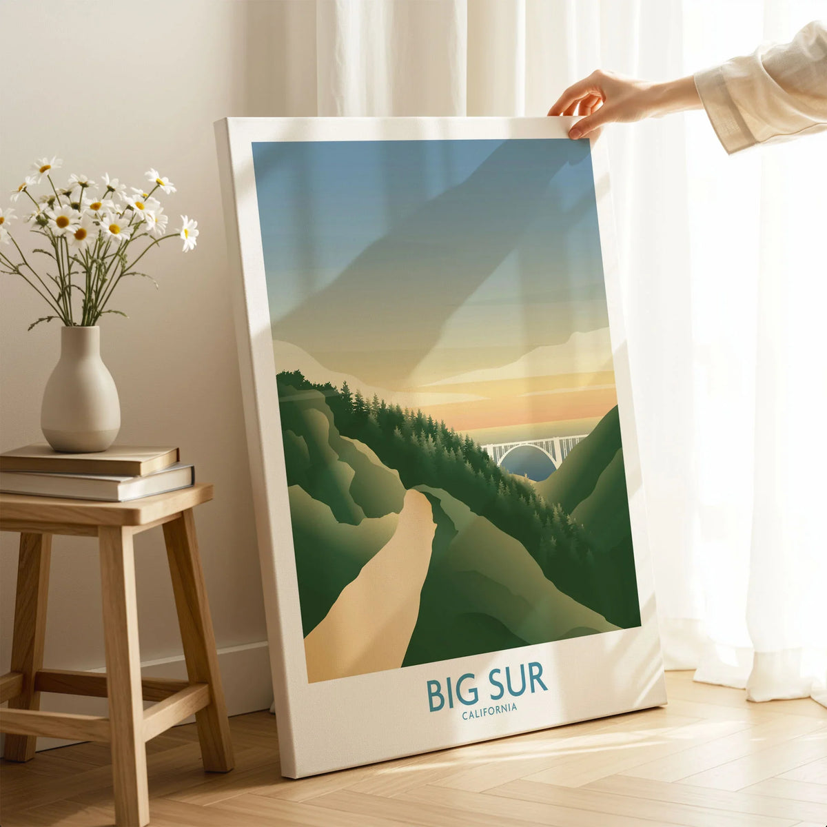 Big Sur California Art Print on stretched canvas with mirror-wrap edges, held by hand in a room setting