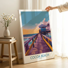 Cocoa Beach Florida Wooden Pier Poster - Golden Hour Sunset Decor on stretched canvas with mirror-wrap edges, held by hand in a room setting