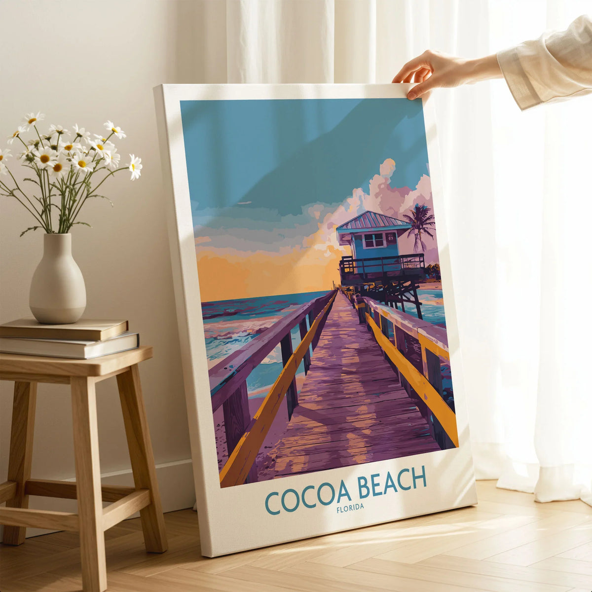 Cocoa Beach Florida Wooden Pier Poster - Golden Hour Sunset Decor on stretched canvas with mirror-wrap edges, held by hand in a room setting
