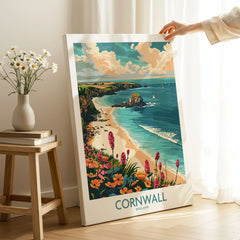 Cornwall Travel Poster - United Kingdom on stretched canvas with mirror-wrap edges, held by hand in a room setting