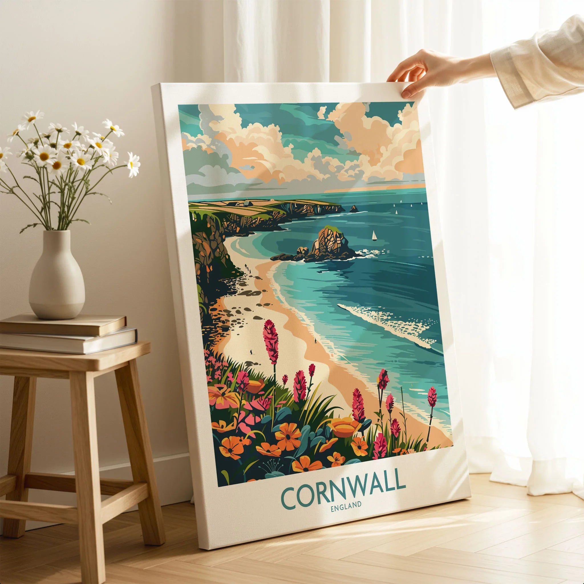 Cornwall Travel Poster - United Kingdom on stretched canvas with mirror-wrap edges, held by hand in a room setting