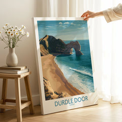 Durdle Door Art Print Dorset Wall Art on stretched canvas with mirror-wrap edges, held by hand in a room setting