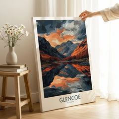 Glencoe Wall Art Poster on stretched canvas with mirror-wrap edges, held by hand in a room setting